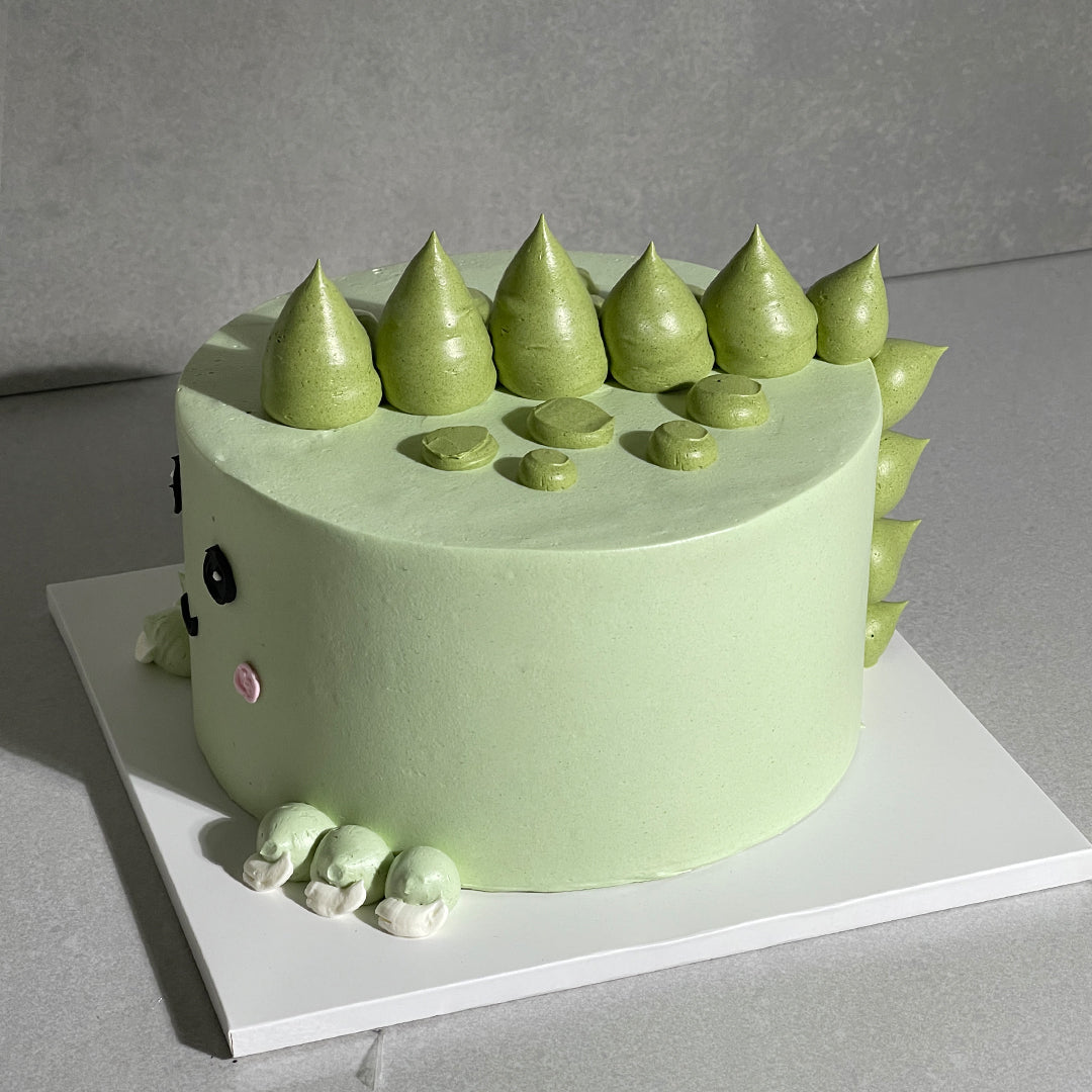 C19. Buttercream Dinosaur Cake