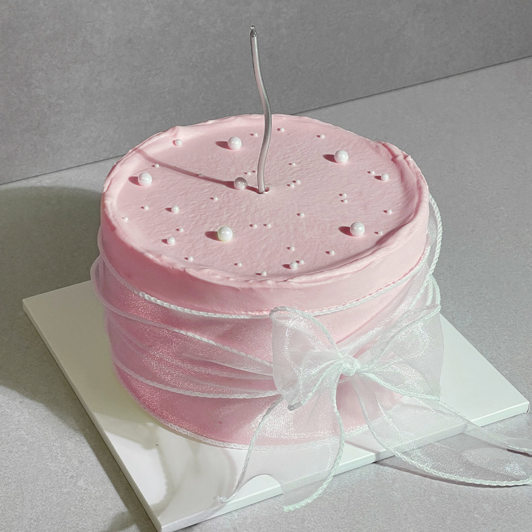 C12. Pearl Ribbon Cake